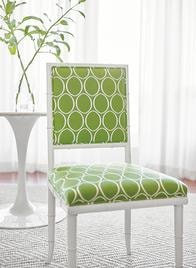 Accent chair with upholstery in bright interior