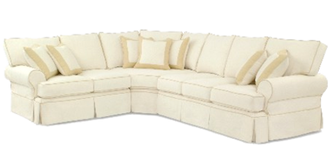 Cream colored sectional slipcover sofa