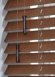 Wooden venetian blinds — warm brown tones
